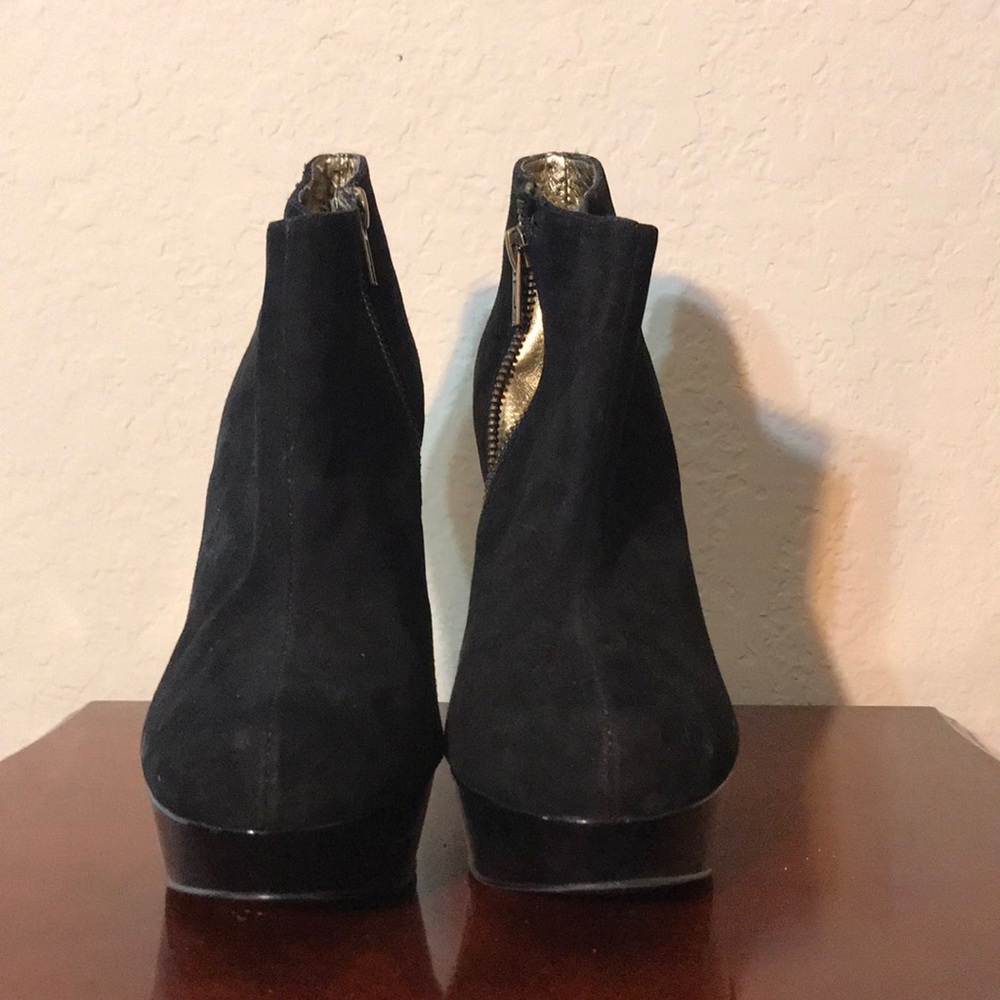 Black high heeled boots